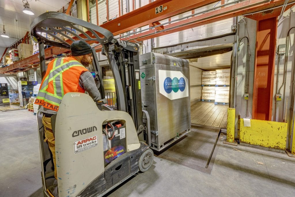 CryoLogistics SnowSHIP Unit being loaded onto a truck by a forklift